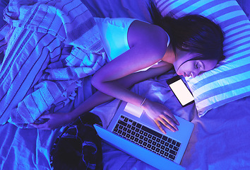 Image showing Woman, night and technology while sleeping in home bed with light from laptop and phone in bedroom. Tired student person with burnout asleep online for remote work or mockup social media chat on top