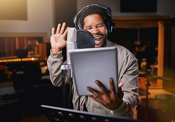 Image showing Tablet, music studio and man singing lyrics, song production or musician training for creative industry talent. Radio, microphone and audio of african person or singer voice on digital recording app