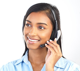 Image showing Crm, customer service and contact us Indian woman worker on a business call in a studio. Marketing, networking and web support consulting of a employee with a smile from call center sales work