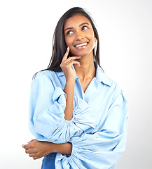 Image showing Thinking, Indian woman and studio with fashion, style and modern business clothing. Isolated, white background and young person with ideas, happiness and content with stylish clothing and idea