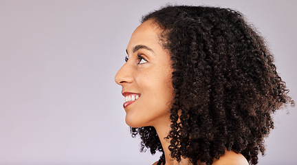 Image showing Black woman, hair care and wellness from skin glow and dermatology in a studio. Profile, happiness and cosmetics of a young model with afro feeling happy from spa, facial and wellness treatment