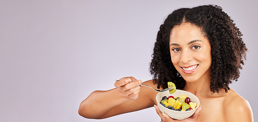 Image showing Black woman, fruit salad and studio portrait for breakfast, nutrition and smile by background. Young african, gen z model and fruits for healthy, diet and beauty mockup with energy, happiness or care