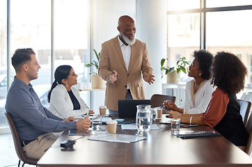 Image showing People listening to boss in business meeting, workshop or seminar for office update, strategy or planning. Senior black man, executive or ceo speaking of company management to professional employees