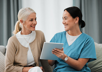 Image showing Asian woman nurse, senior patient and tablet for consulting, healthcare and report for medical help. Japanese doctor, women and digital touchscreen ui for consultation room, happy or smile for advice