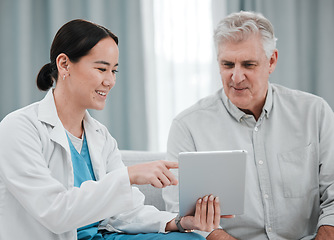 Image showing Woman doctor, tablet and senior patient consultation for healthcare advice, services and test results review. Medical professional or asian person talking of healthcare data on digital technology