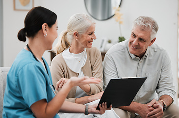 Image showing Nurse, healthcare and consulting with a senior couple in their home, talking to a medicine professional. Medical, insurance or life cover with a mature man and woman meeting a medicine professional
