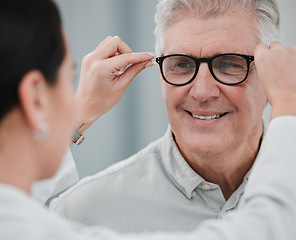 Image showing Glasses check, senior vision and elderly man at a consulting optometry clinic for wellness. Happy, smile and old face with lens, frame and eyewear choice in a store for help getting a prescription