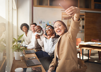 Image showing Selfie, friends and memory with a business team working in the boardroom of their corporate workplace. Teamwork, profile picture and startup with a group of people posing for a photograph together