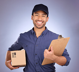 Image showing Delivery man, box and portrait isolated on studio background with courier services and clipboard and smile. Asian worker, supplier or logistics person package for Korea distribution and product sales