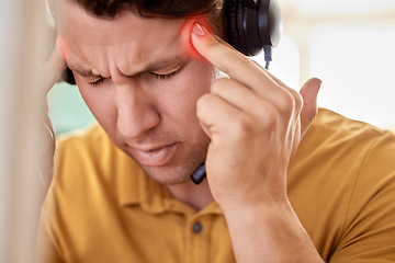 Image showing Stress, call center and man with headache, burnout and overworked with pain, overtime and exhausted. Male employee, customer service or consultant with migraine, telemarketing or anxiety in workplace