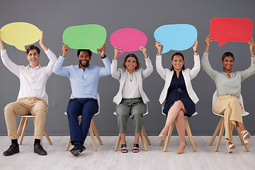 Image showing Speech bubble, business people together and smile on chair for recruitment, hiring and diversity in office. Corporate group, businessman and women with opinion, portrait and team building with poster