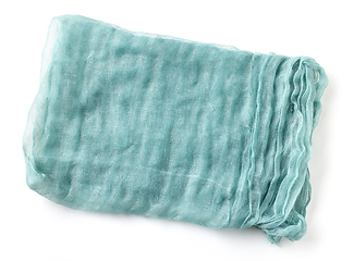 Image showing folded crumpled blue cotton napkin