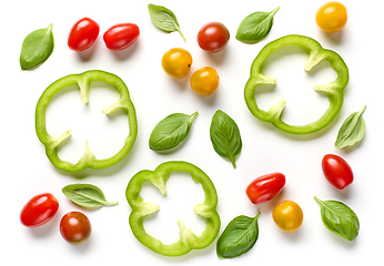 Image showing green paprika slices, colorful tomatoes and basil leaves