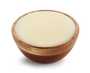 Image showing condensed milk in wooden bowl