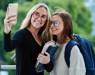 Image showing Selfie, women and students on campus, goals and happiness with success, cheerful and books. Females, girls and academics with smartphone, social media and connection outdoor and picture for memories