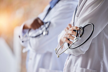 Image showing Healthcare, stethoscope and hands of doctors with crossed arms for trust, medical care and consulting. Hospital mockup, wellness and health worker team for cardiology, insurance and medicare tools