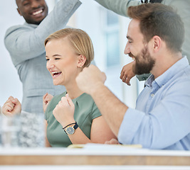 Image showing Winner, wow and motivation with a business team cheering in celebration of success together at the office. Goal, target or teamwork with a man and woman employee group celebrating a work deal