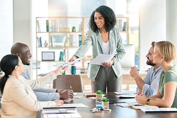 Image showing Black woman, leader with business people and team in meeting, paperwork and presentation with collaboration. Diversity, teamwork and project proposal with speaker, happy group in conference room