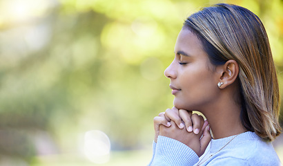 Image showing Prayer, peace and worship with woman in nature and mockup for God, spirituality and religion faith. Relax, calm and reflection with girl praying in park for health, wellness and meditation belief