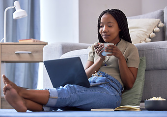 Image showing Happy, black woman on floor and laptop to relax, smile and peace in living room, connection and streaming. African American female, lady and device for movies, funny videos and happiness in lounge