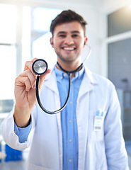 Image showing Cardiology doctor, stethoscope and man in portrait for healthcare, heart wellness and consultation pov in hospital. Friendly medical professional or cardiologist in clinic exam for happy services