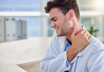 Image showing Tired man doctor with neck pain in office overworked, burnout or stress for healthcare or hospital depression. Medical professional worker, frustrated person or angry nurse for muscle injury at desk