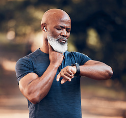 Image showing Black man, fitness and watch for pulse time and exercise while listening to music outdoor. Senior person with smartwatch for performance in nature forest with training workout for health and wellness