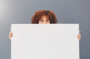 Image showing Black woman, poster and advertising with mockup and marketing, product placement and portrait on studio background. Banner, white space and female with board, design and branding or promotion