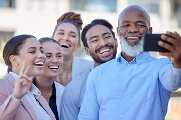 Image showing Business people, selfie and diversity, happy with team building outdoor and corporate. Happiness, smile in photograph with peace hand sign and social media post with company profile picture and group