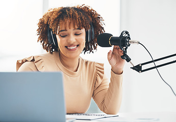 Image showing Laptop, microphone and media with a black woman presenter talking during a broadcast while live streaming. Influencer, talk show and radio with a female journalist or host chatting on a mic