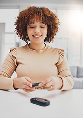 Image showing Health, diabetes and black woman with blood sugar test on finger, wellness and digital device. African American female, lady and machine to check glucose level, happiness and technology for self care