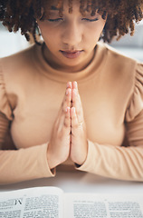 Image showing Black woman praying hands with book for religion, faith and god help, holy support and spiritual healing. Prayer hands, hope and christian person with bible education for hope, trust and worship