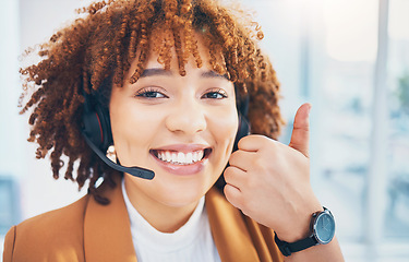 Image showing Woman, smile portrait and thumbs up in call center for customer service, support or crm. Black person consultant, receptionist or agent for telemarketing, contact us or help desk success hand sign