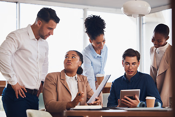 Image showing Business people, tablet and brainstorming meeting in collaboration for marketing idea, planning or strategy at office. Group of creative employees discussing project plan in teamwork for startup