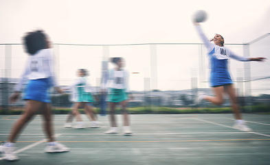 Image showing Sports, netball and fitness jump by women at outdoor court for training, workout and practice. Exercise, students and girl team with ball for competition, speed and performance while active at field
