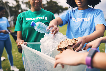 Image showing Recycle, plastic bag and ngo volunteer group cleaning outdoor park for sustainability. Nonprofit, recycling project and waste clean up in nature for earth day, climate change and community support