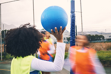 Image showing Sports, fitness and netball match by women at outdoor court for training, workout and practice. Exercise, students and girl team with ball for competition, speed and performance while active at field