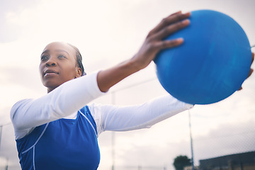 Image showing Fitness, black woman and netball for exercise, training and playing for game, competition and balance. African American female athlete, healthy lady or player with ball, outdoor or practice for match