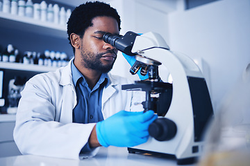 Image showing Microscope, science laboratory and black man research medical analysis, review and biotechnology. Scientist, microbiology and worker study investigation, healthcare innovation or planning expert test