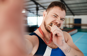 Image showing Sports, gymnastics and selfie with man and medal for award, social media and celebration. Fitness, workout and winner with athlete and training in gym arena for gold, achievement and competition
