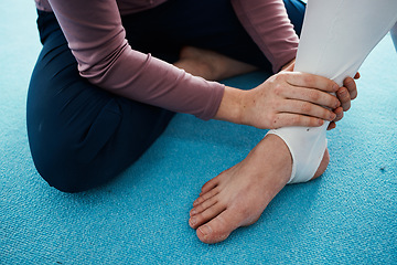 Image showing Injury, hurt and foot or ankle pain for athlete getting help from coach, trainer and sport or gymnastics practice. Person, emergency and closeup of people feet swollen muscle due to exercise accident