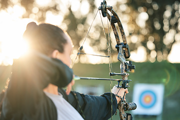 Image showing Archer woman, target and bow and arrow practice for outdoor archery, athlete challenge or girl field competition. Shooting goals, talent and competitive focus on precision training, aim or objective