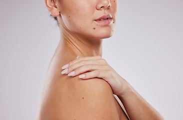 Image showing Skincare, shoulder and woman hands on body for aesthetic wellness, cosmetics or self love on studio background. Beauty model, soft skin and healthy dermatology of salon transformation, glow and laser