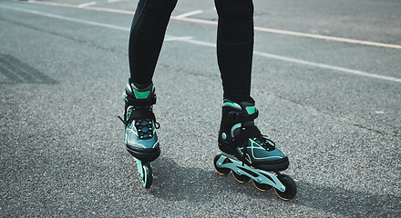 Image showing Street, sports and legs of a woman roller skating for fitness, learning and training in the city. Urban, sport and feet and shoes of a person in the road to learn to skate, exercise and hobby
