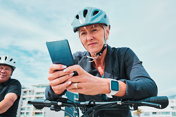 Image showing Mature woman, phone or electrical bike helmet in transport location, clean energy or sustainability travel with GPS map. Technology, electric or eco friendly bicycle and mobile, cycling man or couple