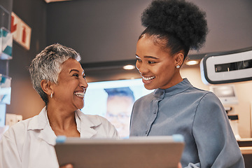 Image showing Optometry, tablet and optometrist talking to a patient about eye test results or consultation. Discussion, technology and senior optician speaking to a female with a mobile device at a optical clinic