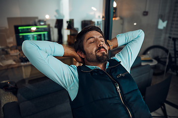 Image showing Developer man, relax or peace in home office with hand on head for achievement, thinking about goals or target. Sleeping, night or entrepreneur on chair for break, calm or nap for work done in house