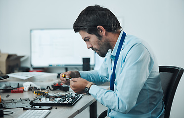 Image showing Man, circuit and tools at repair workshop for maintenance, computer tech or industry with focus. Technician, motherboard and information technology at desk with electronics, engineering and service