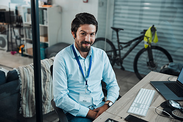 Image showing Man, portrait and IT technician in an office for computer software, technology or problem solving at desk. Happy engineer person doing maintenance, programming and digital development project