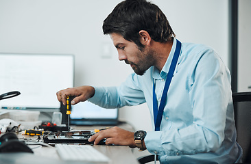Image showing Serious man, it or screwdriver for motherboard fixing in engineering workshop for database update. Technician, circuit board or tools in repair, maintenance upgrade or information technology industry